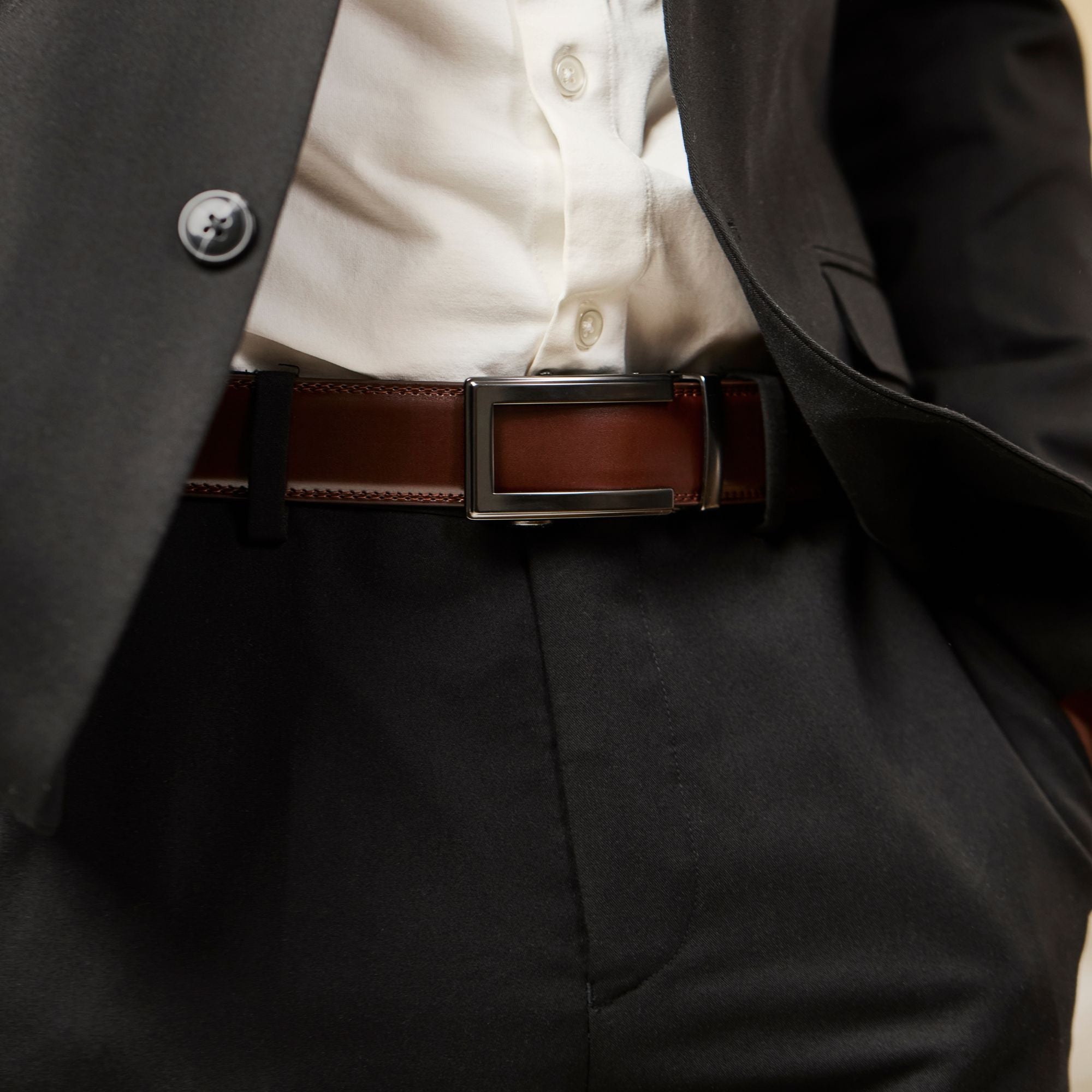 Mörkbrunt läderbälte utan hål